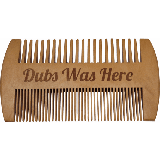 Dual-sided wooden beard comb featuring fine and wide teeth for all beard types. Perfect for even product application and effortless grooming.